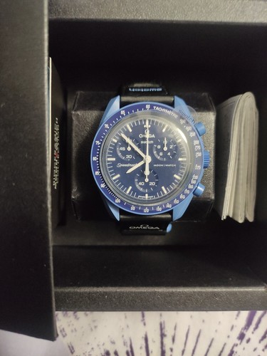 Swatch omega mission - swatch,